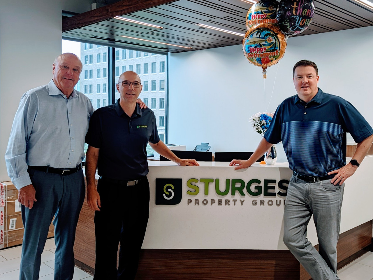 Sturges Property Group - Barry & Brad Sturges with Todd Preston at his Retirement Party